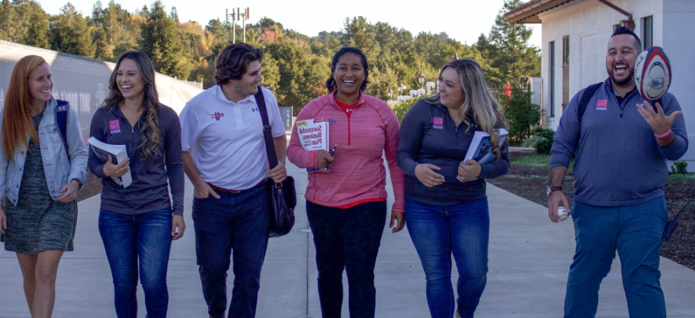 7 kinesiology students walking abreast